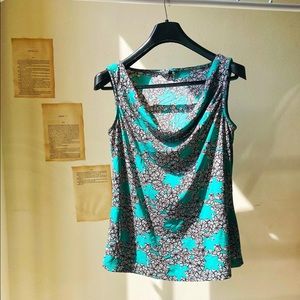 Cowl neck top in green and black.